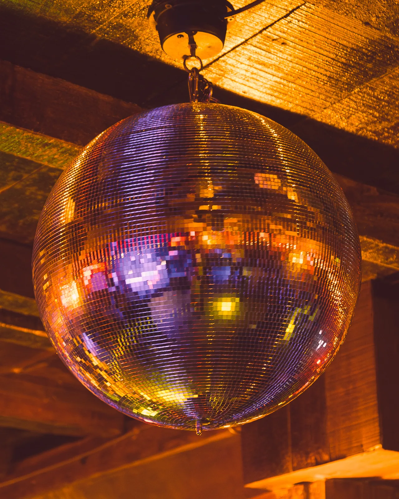 Disco ball beneath the wooden hull ceiling at La Cale, Rabat