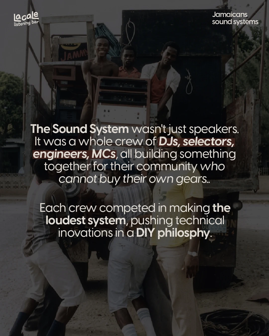 A Jamaican sound system crew loading speaker boxes onto a truck